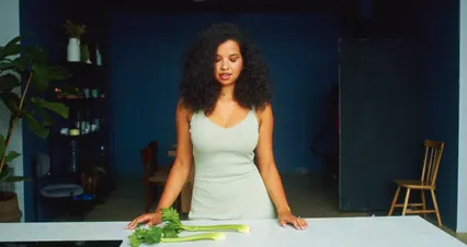 Horizontal video: Woman breaking and eating a celery 8844488. Duration: 8 seconds. Resolution: 4096x2160