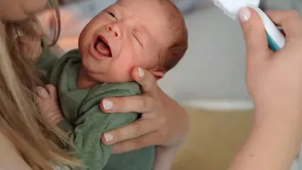 Horizontal video: Mother brushing baby s hair 6849032. Duration: 17 seconds. Resolution: 3840x2160