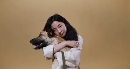Horizontal video: Woman hugging a dog 6568508. Duration: 17 seconds. Resolution: 4096x2160