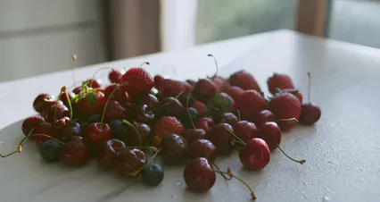 Horizontal video: A bunch of cherries on a table in front of a window 4513020. Duration: 13 seconds. Resolution: 4096x2160