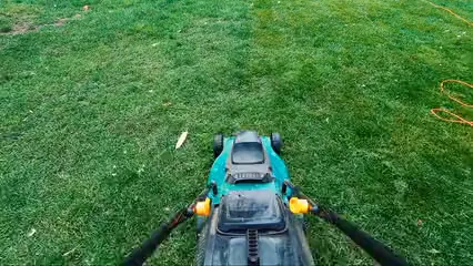 Horizontal video: A person using lawn mower 5176975. Duration: 25 seconds. Resolution: 2720x1530