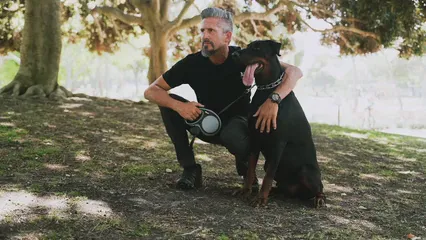 Horizontal video: Man petting a dog 7516704. Duration: 17 seconds. Resolution: 1920x1080