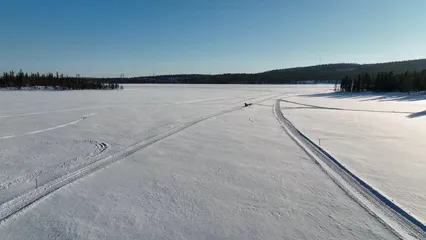 Horizontal video: Riding a dog sled in a snow covered land 11516961. Duration: 15 seconds. Resolution: 3840x2160