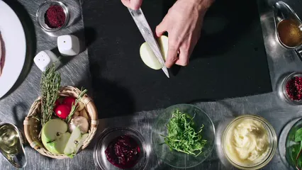 Horizontal video: Cutting a green apple into pieces using a knife 3209013. Duration: 17 seconds. Resolution: 3840x2160