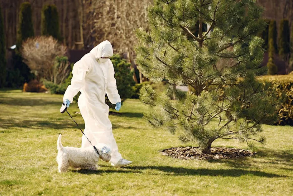 Person Wearing Protective Suit Walking the Dog Outside