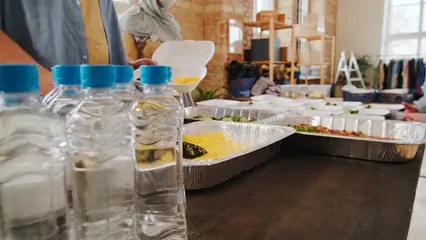 Horizontal video: Volunteers serving food 6894109. Duration: 10 seconds. Resolution: 3840x2160