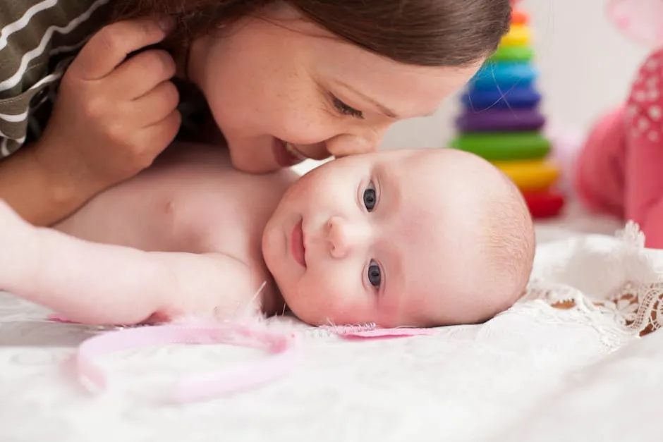 Mother Kissing Her Baby