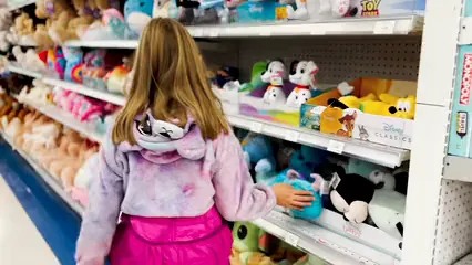 Horizontal video: Girl in a toy store 14561469. Duration: 11 seconds. Resolution: 3840x2160