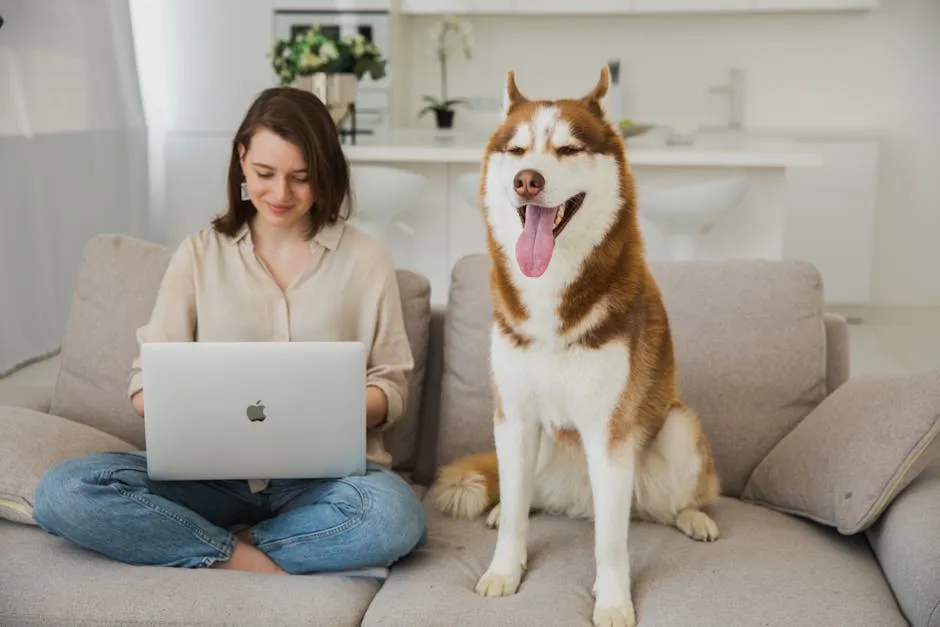 A Woman and a Dog on a Couch 