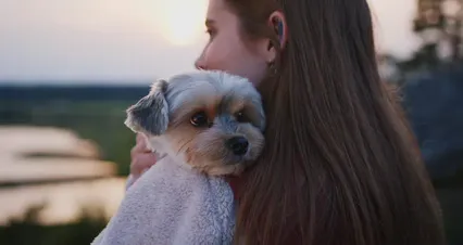 Horizontal video: A woman hugging a dog 6318319. Duration: 46 seconds. Resolution: 4096x2160