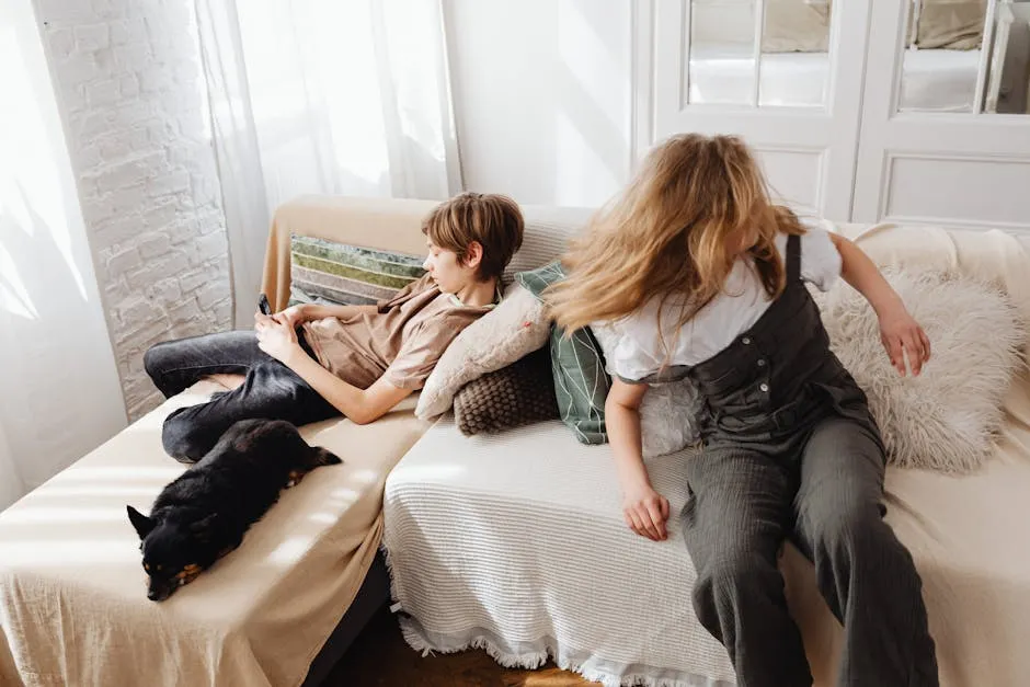 A Black Dog Lying Beside the Sleeping Boy