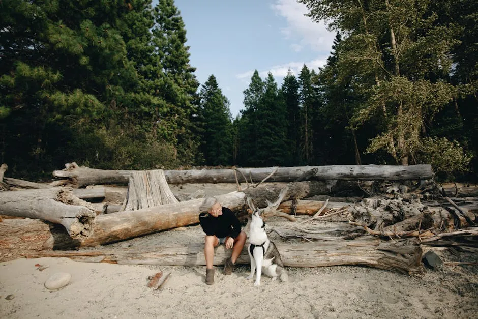 A Woman Sitting with a Dog