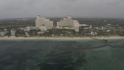 Horizontal video: Aerial view of a luxurious beach resort 9432068. Duration: 12 seconds. Resolution: 2688x1512