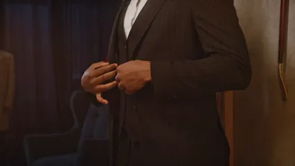 Horizontal video: Smiling man trying on a suit 6766323. Duration: 21 seconds. Resolution: 3840x2160