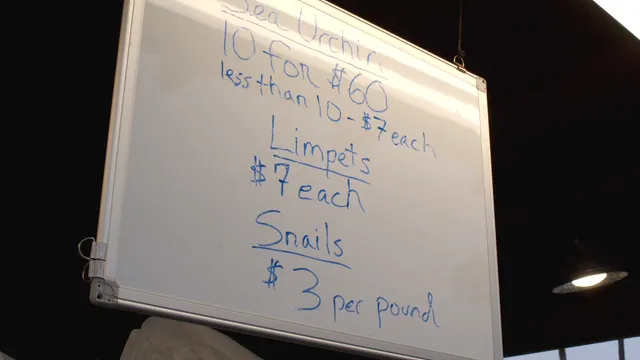 Horizontal video: Seafood prices written on a whiteboard 8352217. Duration: 8 seconds. Resolution: 3840x2160