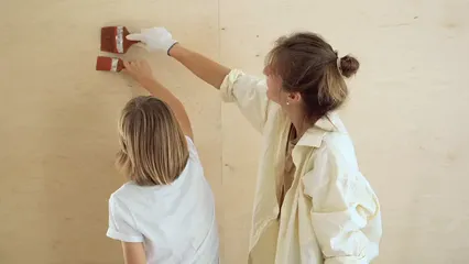 Horizontal video: Mother and son painting their home 5799461. Duration: 12 seconds. Resolution: 1920x1080