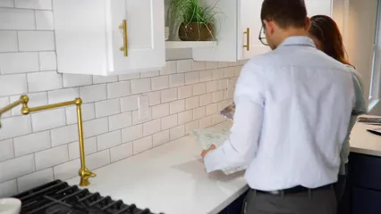 Horizontal video: A man and a woman choosing tiles for a wall renovation 8293011. Duration: 10 seconds. Resolution: 1920x1080