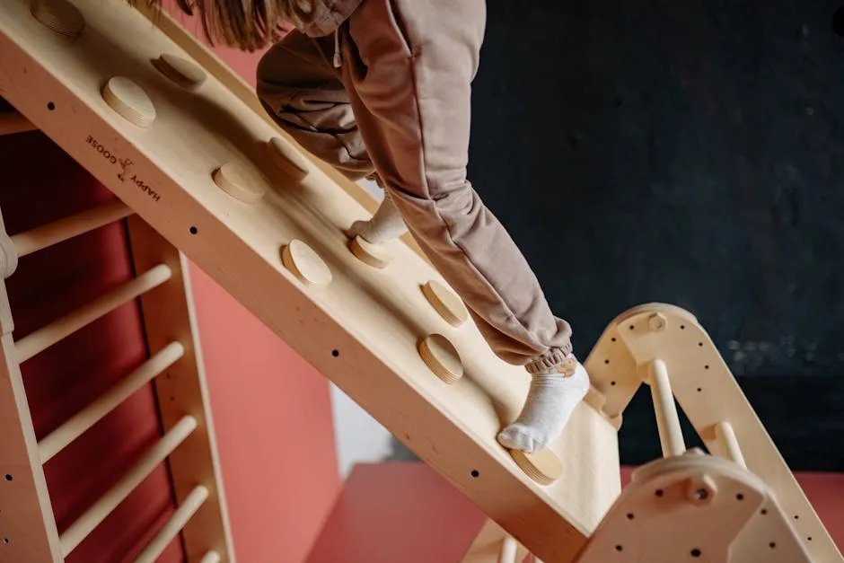 Girl Climbing a Wooden Climber