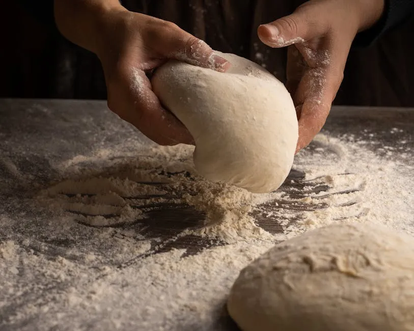 Person Holding a Dough