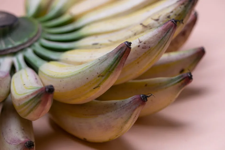 Bananas placed on pink surface