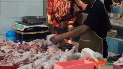 Horizontal video: Person cutting chicken 3680161. Duration: 37 seconds. Resolution: 3840x2160