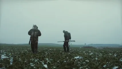 Horizontal video: Soldiers walking with a dog 6200832. Duration: 16 seconds. Resolution: 3840x2160