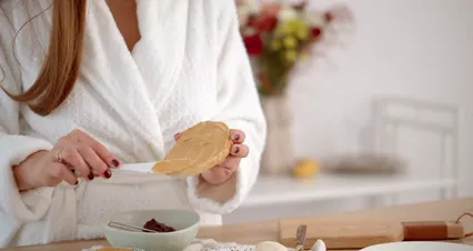 Horizontal video: Person putting peanut butter on bread 6658793. Duration: 8 seconds. Resolution: 4096x2160