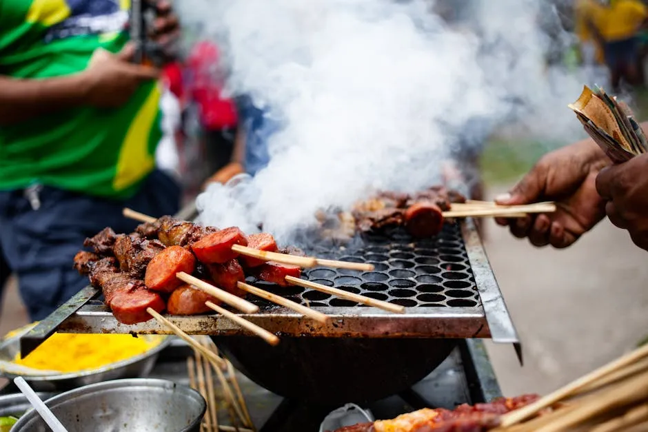 Closeup of Meat Skewers on a Grill, and Smoke