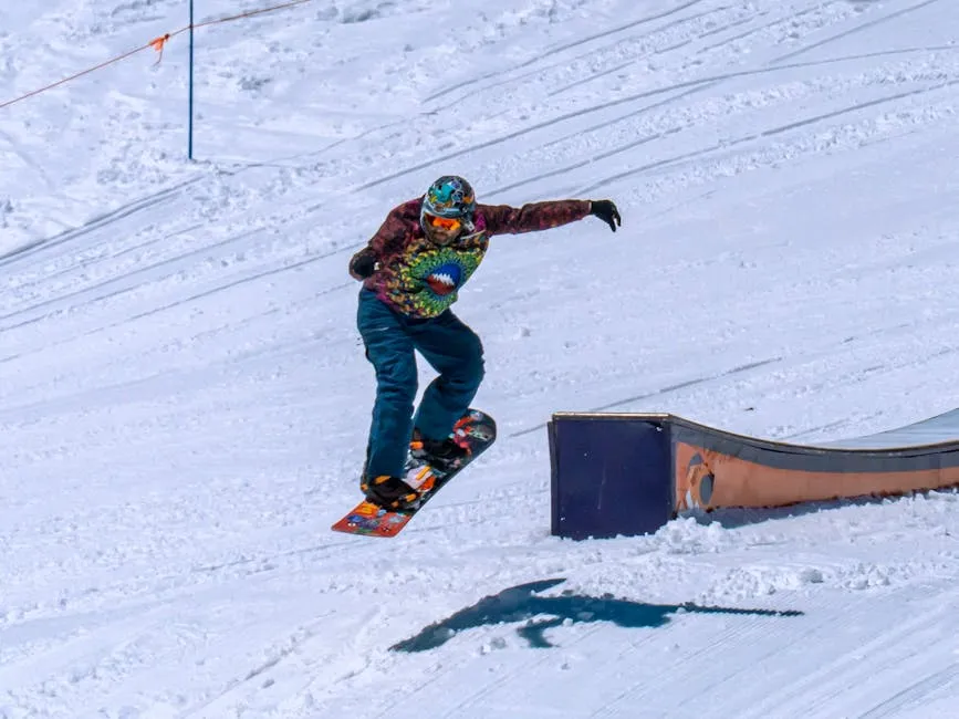 Exciting Snowboard Trick in Winter Terrain Park