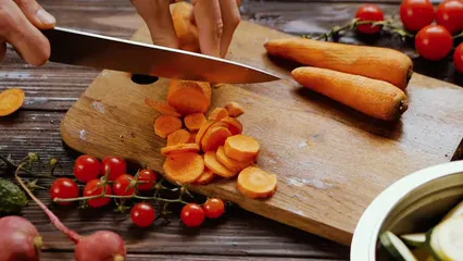Horizontal video: A person slicing up the carrots by using a knife 5645055. Duration: 29 seconds. Resolution: 1920x1080
