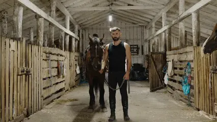 Horizontal video: Man beside a horse 5087854. Duration: 8 seconds. Resolution: 3840x2160
