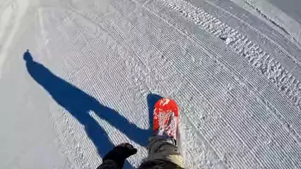 Horizontal video: Snowboarding down a slope 6818701. Duration: 27 seconds. Resolution: 3840x2160