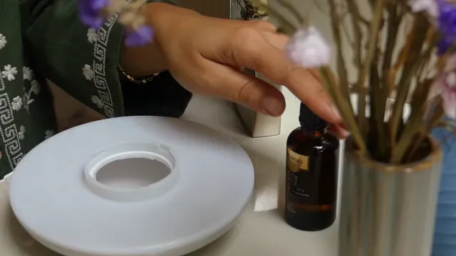 Horizontal video: Person putting oil on a diffuser 9279905. Duration: 65 seconds. Resolution: 1920x1080