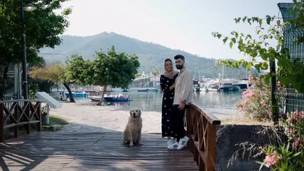 Horizontal video: A couple with their dog 8296265. Duration: 36 seconds. Resolution: 1920x1080