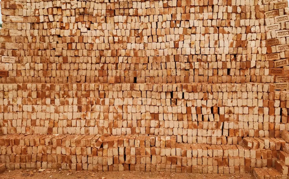 A close-up view of a stack of red bricks, ideal for construction and building materials imagery.